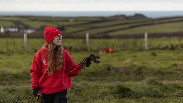 Young volunteers planting trees at East Titchberry, Devon